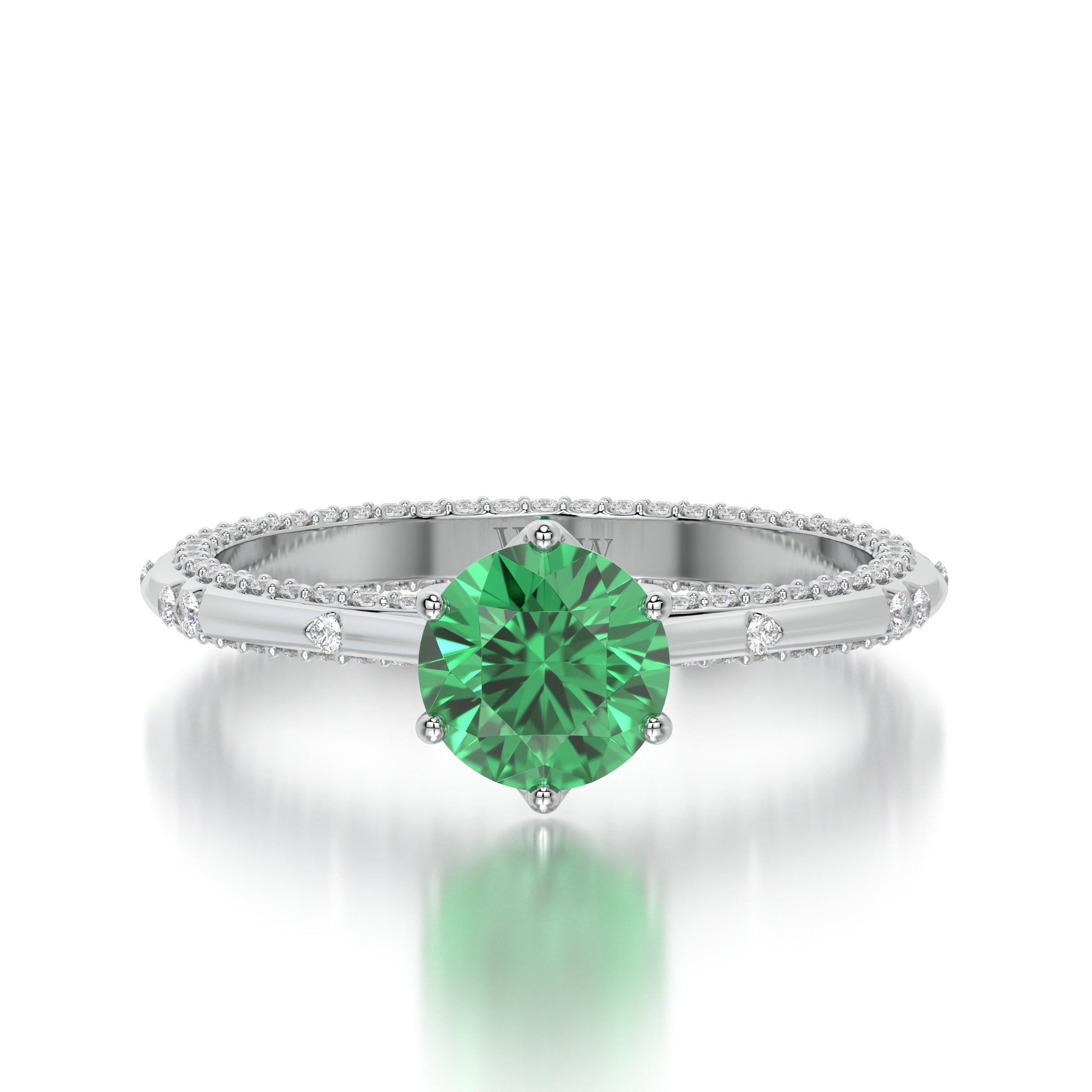 Bague princess en or blanc diamants et émeraude