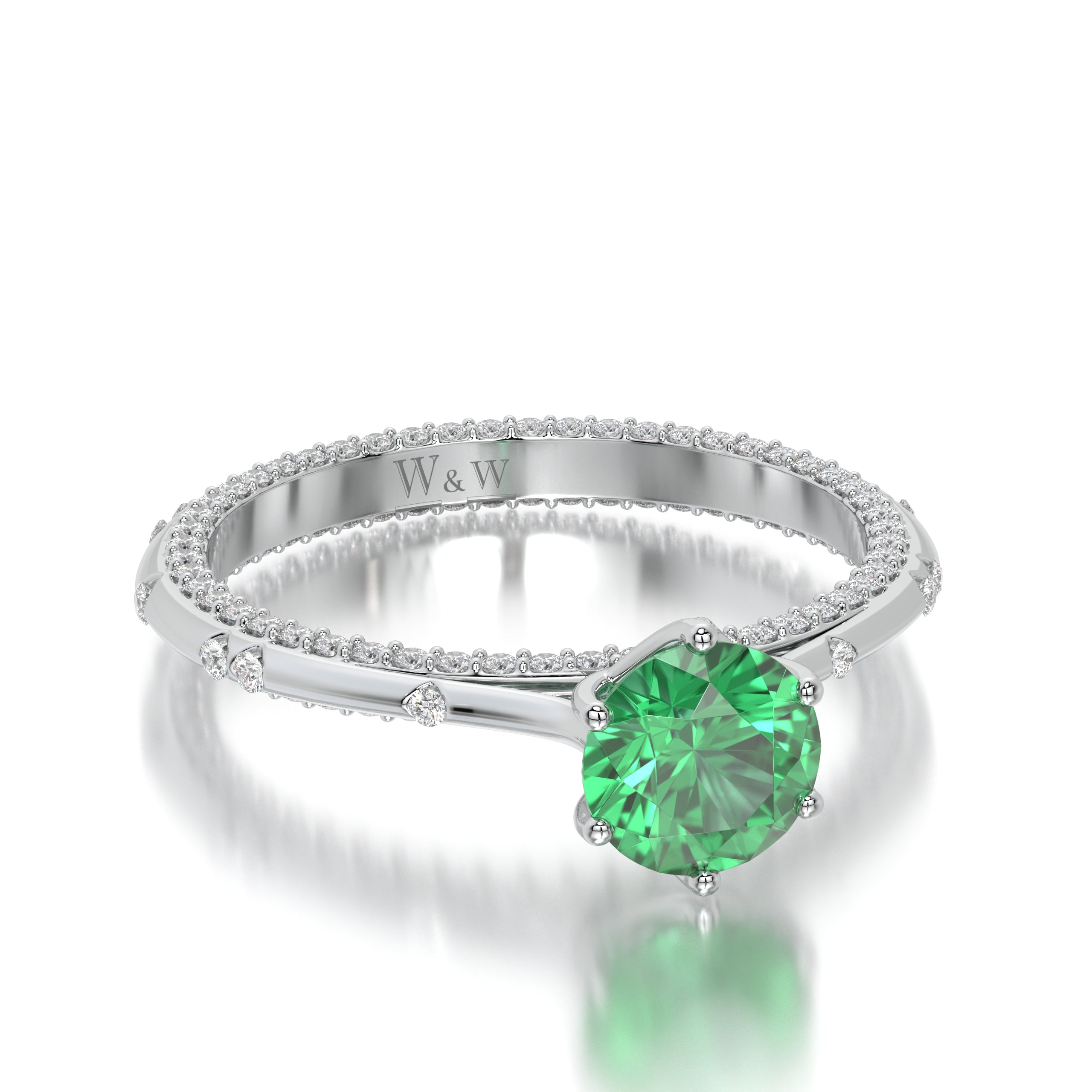 Bague princess en or blanc diamants et émeraude