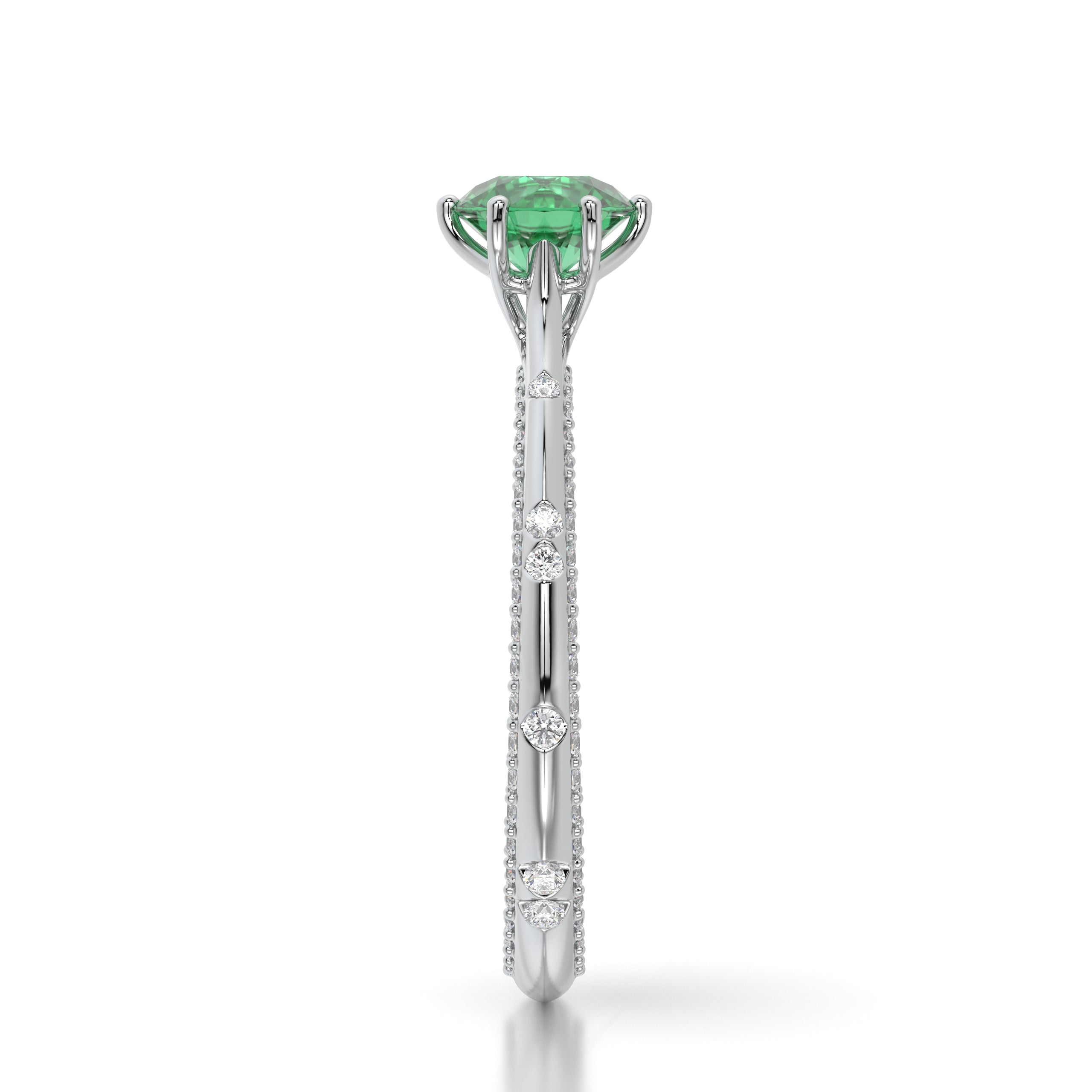 Bague princess en or blanc diamants et émeraude