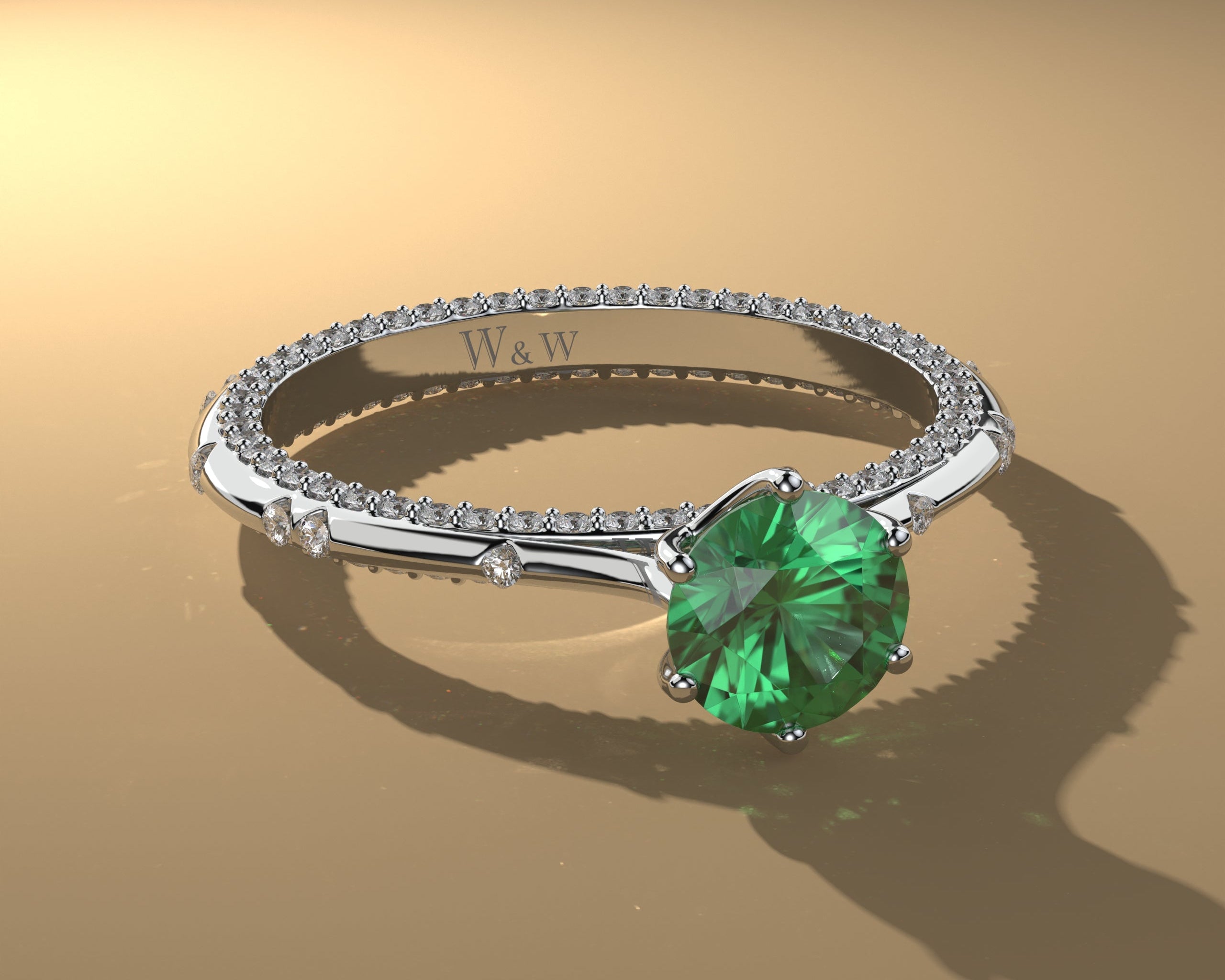 Bague princess en or blanc diamants et émeraude