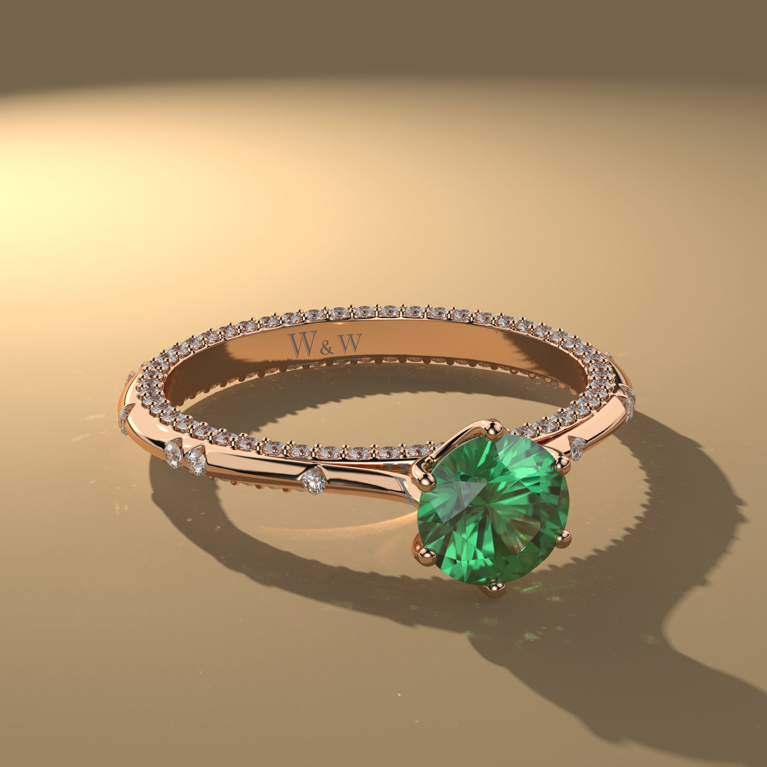 Bague princess en or rose diamants et émeraude