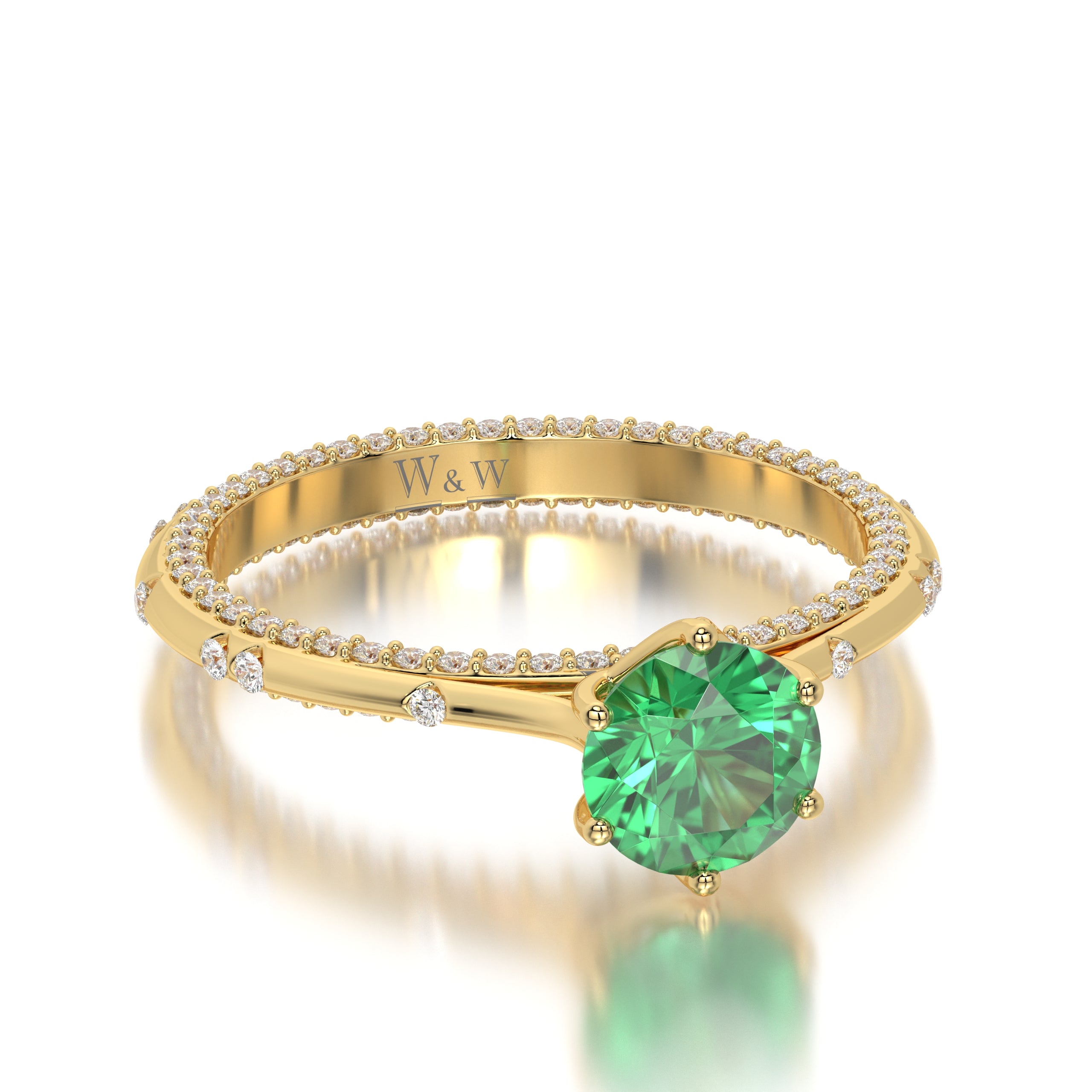 Bague princess en or jaune diamants et émeraude