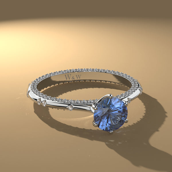 Bague princess en or blanc diamants et saphir