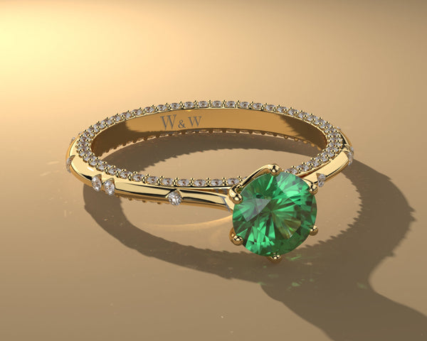 Bague princess en or jaune diamants et émeraude